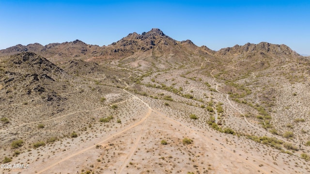 view of mountain feature featuring a rural view and a desert view