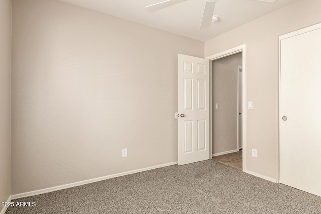 125 N 22nd Pl Unit 53, Mesa, AZ 85213 - unfurnished bedroom with carpet flooring, a ceiling fan, and baseboards