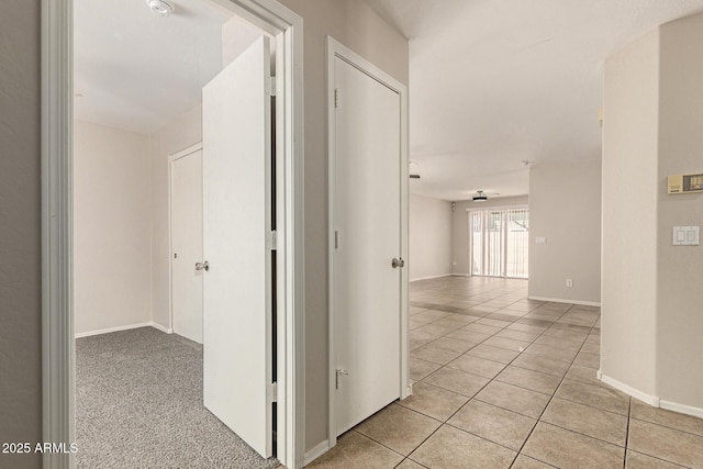 125 N 22nd Pl Unit 53, Mesa, AZ 85213 - hall with light tile patterned floors and baseboards