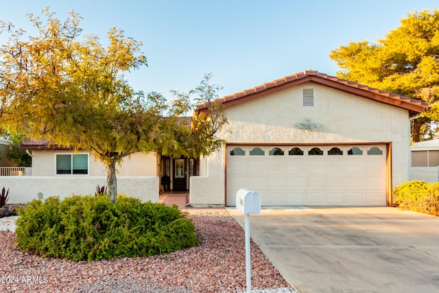 view of front of house with a garage