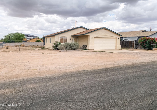 5122 E Shadow Ln, San Tan Valley, AZ 85140 - view of front of property featuring fence, stucco siding, a garage, and concrete driveway