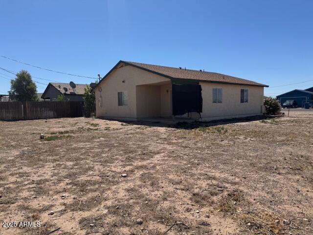 5122 E Shadow Ln, San Tan Valley, AZ 85140 - view of side of home featuring fence and stucco siding