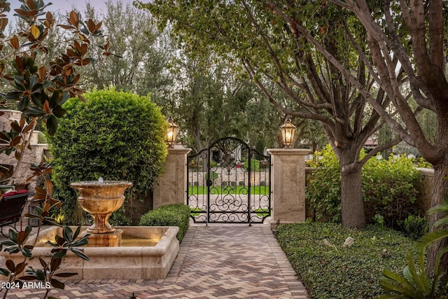 view of gate with fence