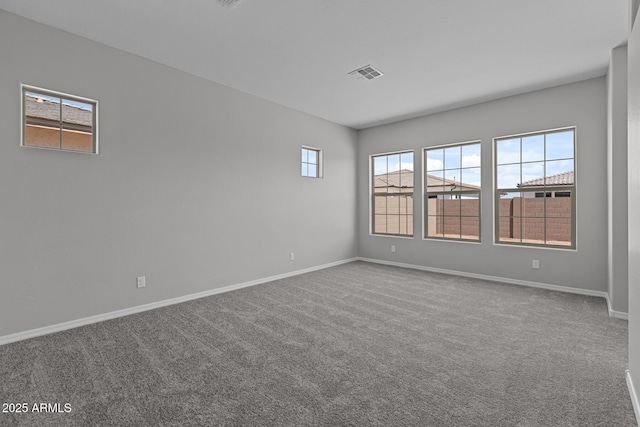 12332 W Parkway Ln, Avondale, AZ 85323 - spare room with baseboards and carpet floors