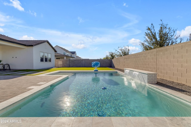 view of pool with pool water feature