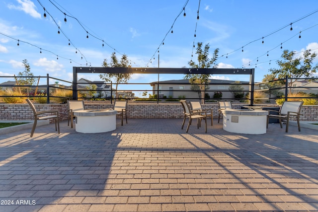 view of patio featuring a fire pit