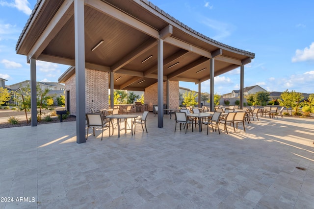 view of patio with area for grilling and exterior bar