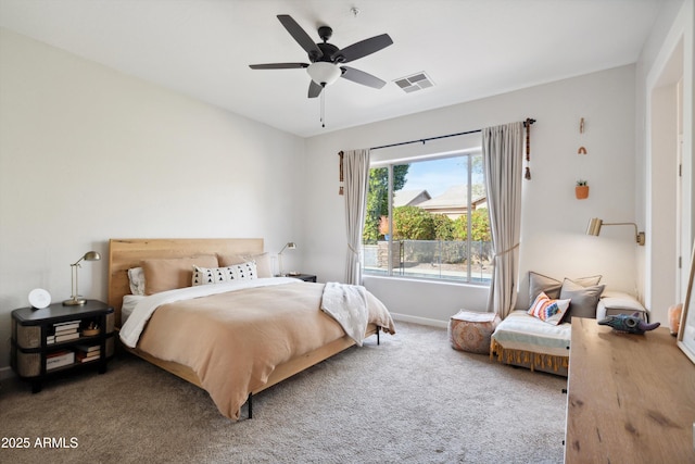 bedroom with ceiling fan and carpet flooring