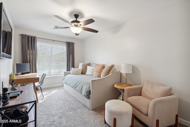 carpeted bedroom featuring ceiling fan