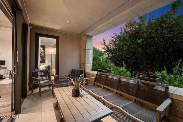 view of patio terrace at dusk