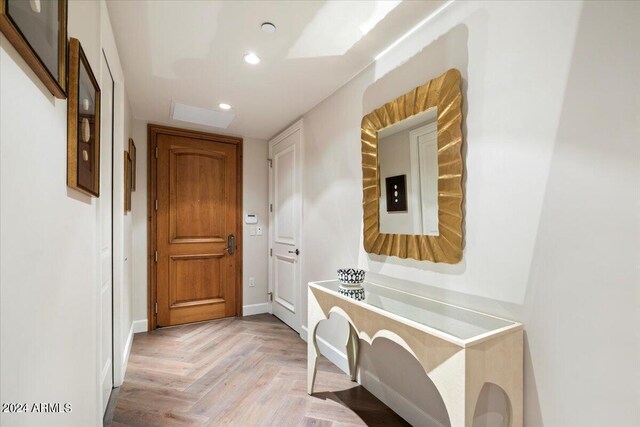 hallway with light parquet floors