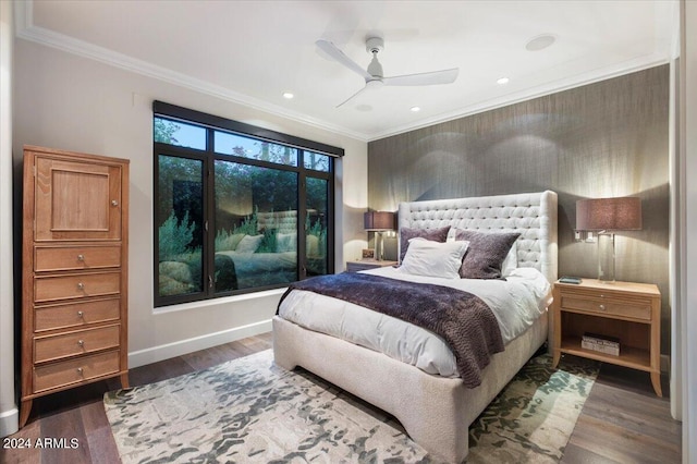 bedroom featuring ornamental molding, ceiling fan, and dark hardwood / wood-style floors