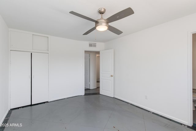 6040 N 31st Dr, Phoenix, AZ 85017 - unfurnished bedroom with a closet, ceiling fan, and tile patterned flooring