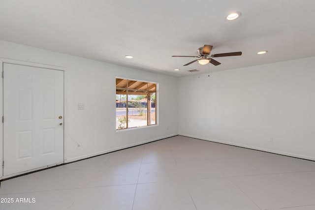 6040 N 31st Dr, Phoenix, AZ 85017 - empty room featuring ceiling fan and recessed lighting