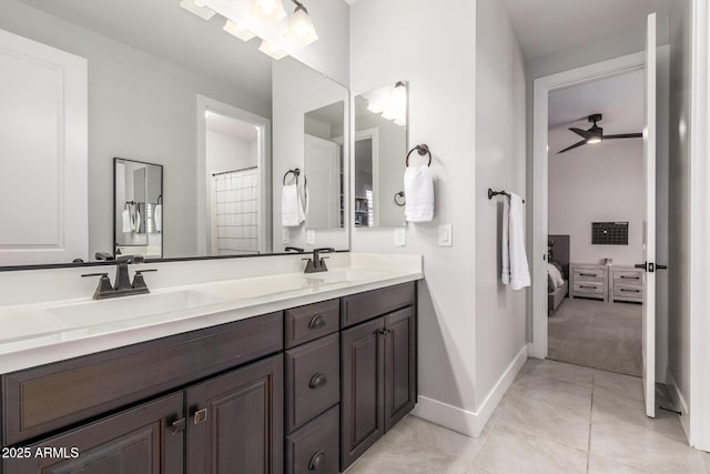 bathroom with vanity and tile patterned flooring