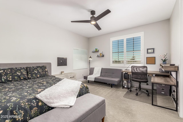 bedroom with light carpet and ceiling fan