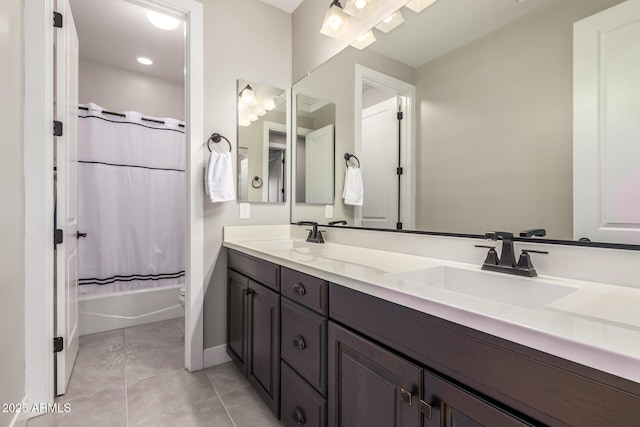 full bathroom featuring vanity, tile patterned floors, toilet, and shower / bath combo