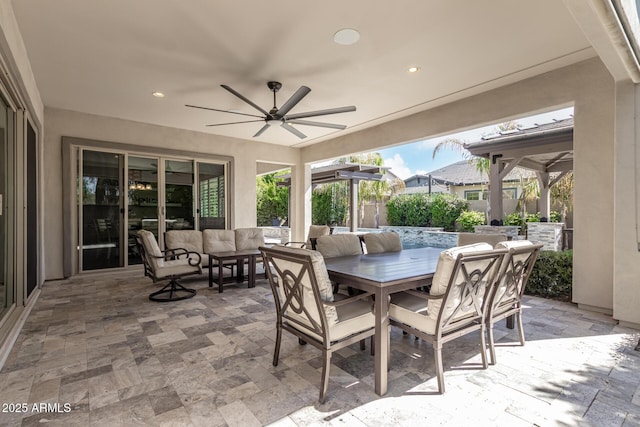 view of patio featuring ceiling fan and an outdoor living space