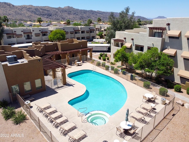 3434 E Baseline Rd Unit 216, Phoenix, AZ 85042 - community pool featuring a patio area, a mountain view, a community hot tub, and a residential view
