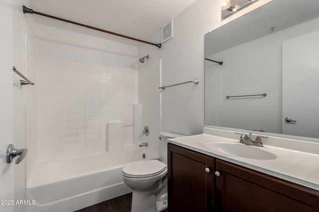 3434 E Baseline Rd Unit 216, Phoenix, AZ 85042 - full bathroom featuring vanity, toilet, bathing tub / shower combination, and wood finished floors