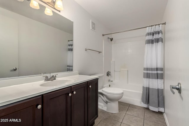 3434 E Baseline Rd Unit 216, Phoenix, AZ 85042 - bathroom featuring tile patterned flooring, vanity, toilet, and shower / tub combo with curtain