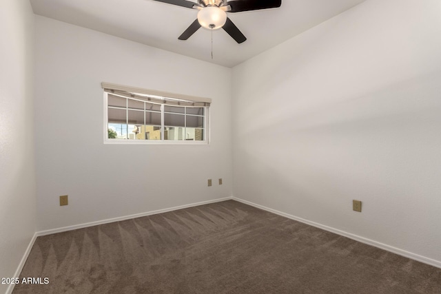 3434 E Baseline Rd Unit 216, Phoenix, AZ 85042 - empty room with dark colored carpet, a ceiling fan, and baseboards