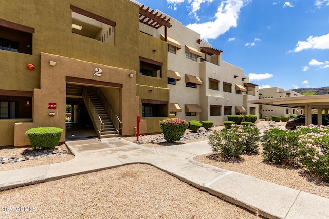 3434 E Baseline Rd Unit 216, Phoenix, AZ 85042 - view of building exterior with a residential view