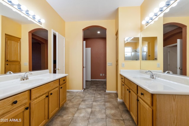 bathroom with vanity and tile patterned flooring