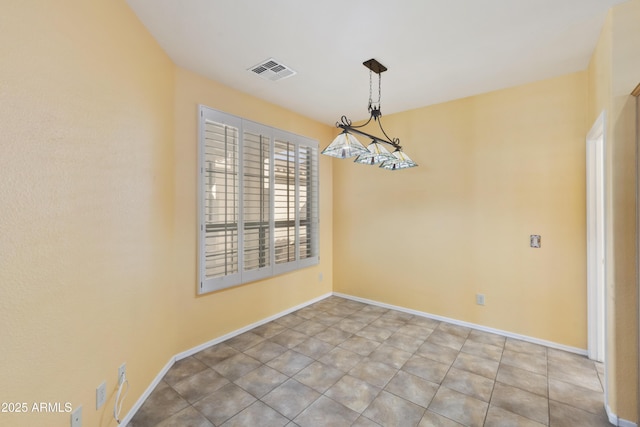 unfurnished dining area with tile patterned floors