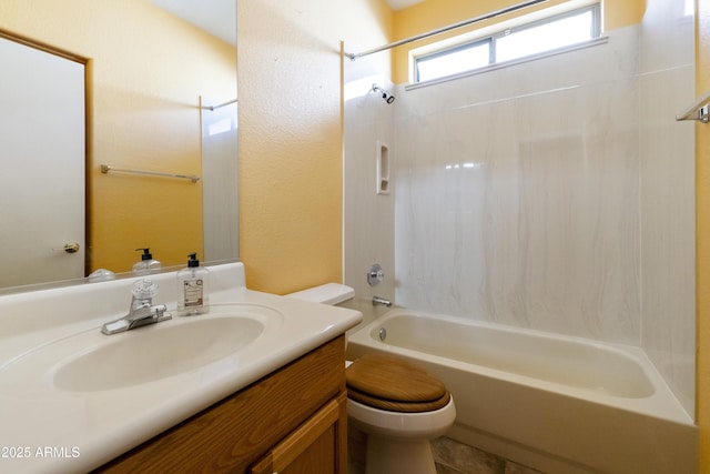 full bathroom with toilet, vanity, and bathing tub / shower combination