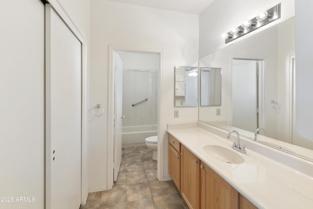 full bathroom with tub / shower combination, toilet, and vanity