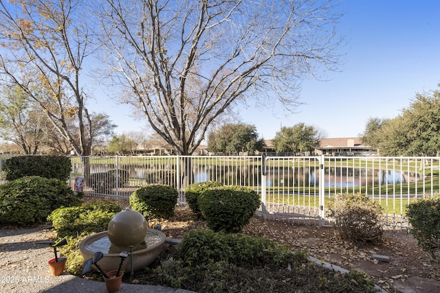 view of yard featuring a water view