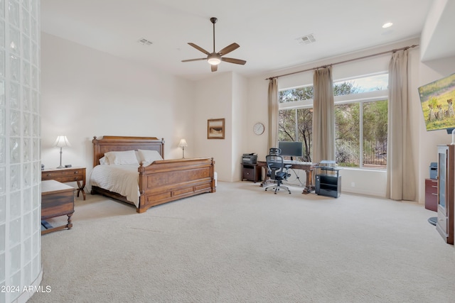 carpeted bedroom with recessed lighting, visible vents, and a ceiling fan