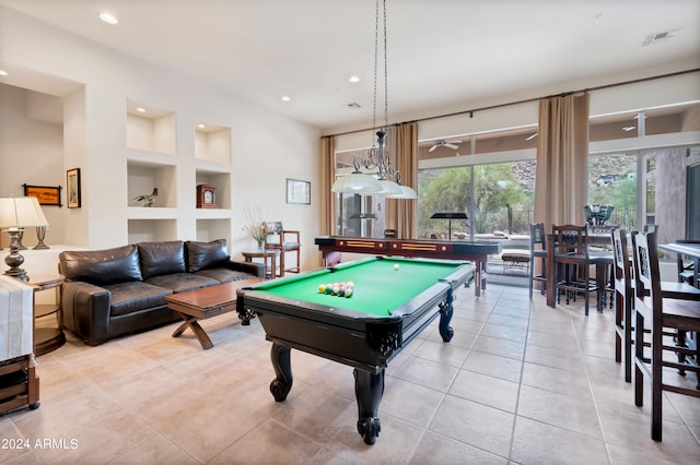 playroom featuring built in features, billiards, and light tile patterned flooring