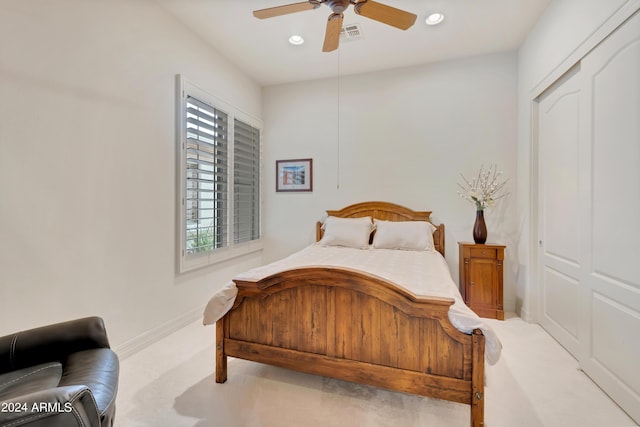 carpeted bedroom featuring a ceiling fan, visible vents, recessed lighting, and baseboards