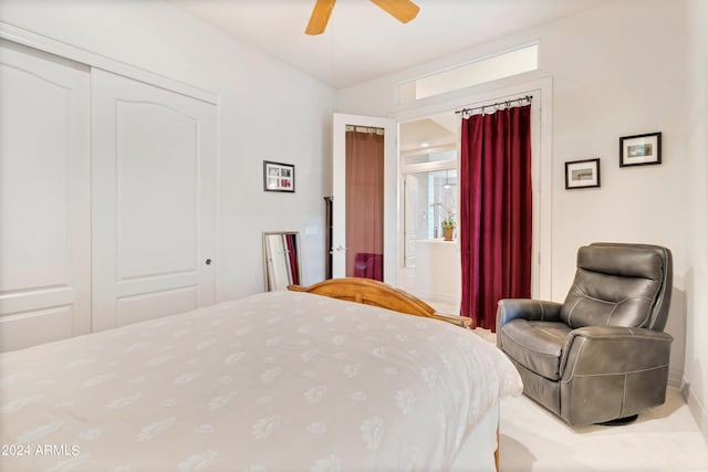 bedroom featuring a closet and a ceiling fan