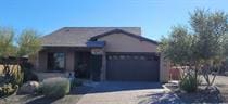 view of front of home with driveway and an attached garage