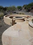 view of pool with an in ground hot tub