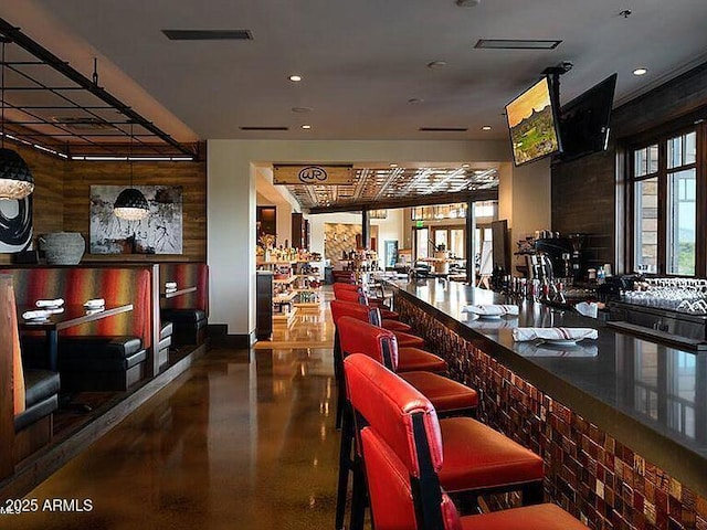 bar with a community bar, visible vents, and recessed lighting