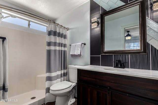 5601 W Whitten St, Chandler, AZ 85226 - bathroom featuring a healthy amount of sunlight, vanity, toilet, and curtained shower