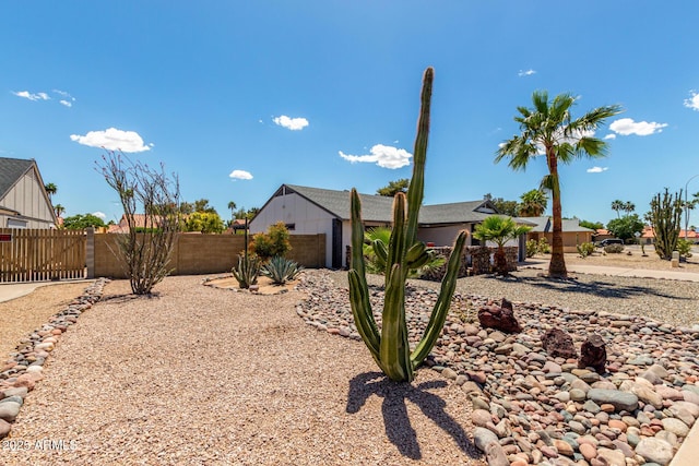 5601 W Whitten St, Chandler, AZ 85226 - view of yard featuring a garage and fence