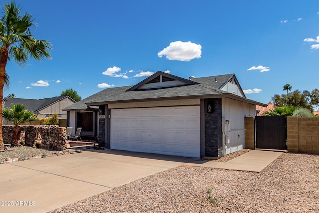 5601 W Whitten St, Chandler, AZ 85226 - ranch-style home featuring roof with shingles, fence, an attached garage, a gate, and driveway