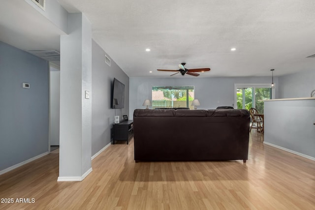 5601 W Whitten St, Chandler, AZ 85226 - living room featuring baseboards, recessed lighting, light wood finished floors, and ceiling fan