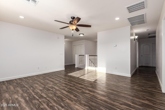 6632 W Saguaro Park Ln, Glendale, AZ 85310 - unfurnished room featuring dark wood finished floors, a ceiling fan, baseboards, and recessed lighting