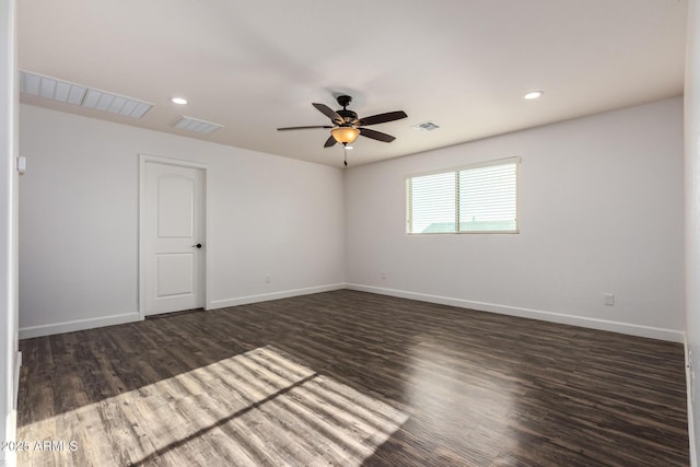 6632 W Saguaro Park Ln, Glendale, AZ 85310 - spare room featuring baseboards, ceiling fan, wood finished floors, and recessed lighting