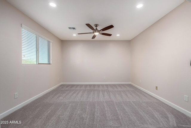 6632 W Saguaro Park Ln, Glendale, AZ 85310 - spare room with carpet, ceiling fan, recessed lighting, and baseboards