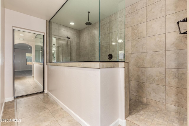 6632 W Saguaro Park Ln, Glendale, AZ 85310 - bathroom with a walk in shower, tile patterned floors, baseboards, and recessed lighting