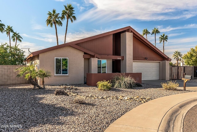 view of front of home with a garage