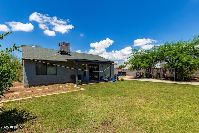161 S Maple St, Chandler, AZ 85226 - back of property with central AC unit, a lawn, and a shingled roof