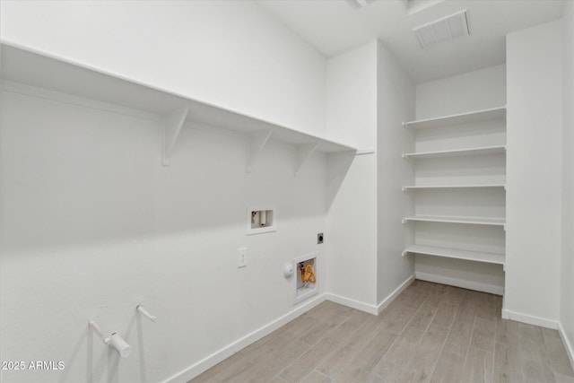 laundry area with washer hookup, hookup for a gas dryer, visible vents, hookup for an electric dryer, and laundry area